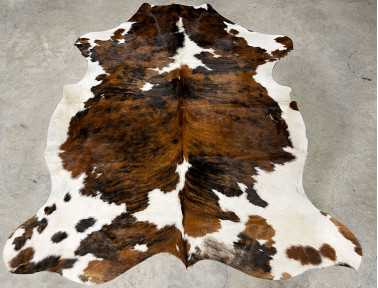 Tapis peau de vache tricolore