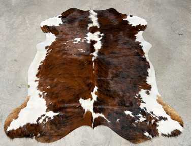 Tapis peau de vache tricolore