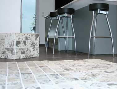 Tapis Patchwork en peau de vache blanche argentée
