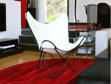 Fauteuil Bonet \"BKF\" en peau de vache