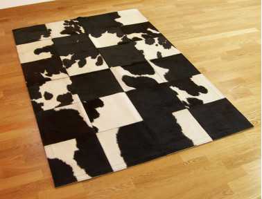 Tapis Patchwork en Peau de vache noire et blanche