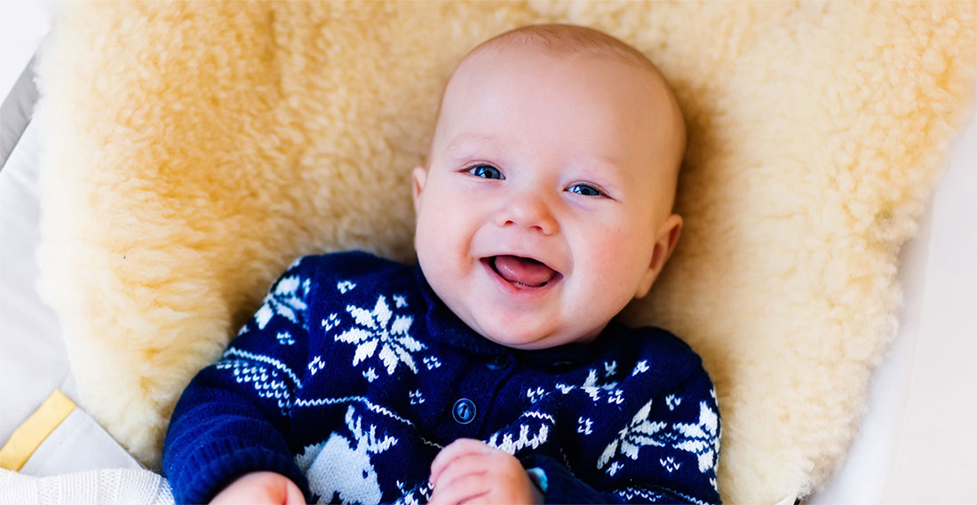Baby laughing on medicalized skin